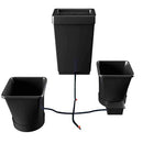 Three black square containers with a central cable on a white background