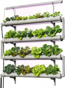 Vertical hydroponic garden with plants and LED lights on a white background