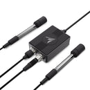 Black electronic device with two cables on a white background