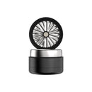 Black and silver container with a fan-like design on a white background