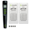 pH meter with calibration buffer solution packets on a white background