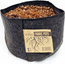Fabric pot with soil and a 'Top Grower Fabric Pots' label on a white background